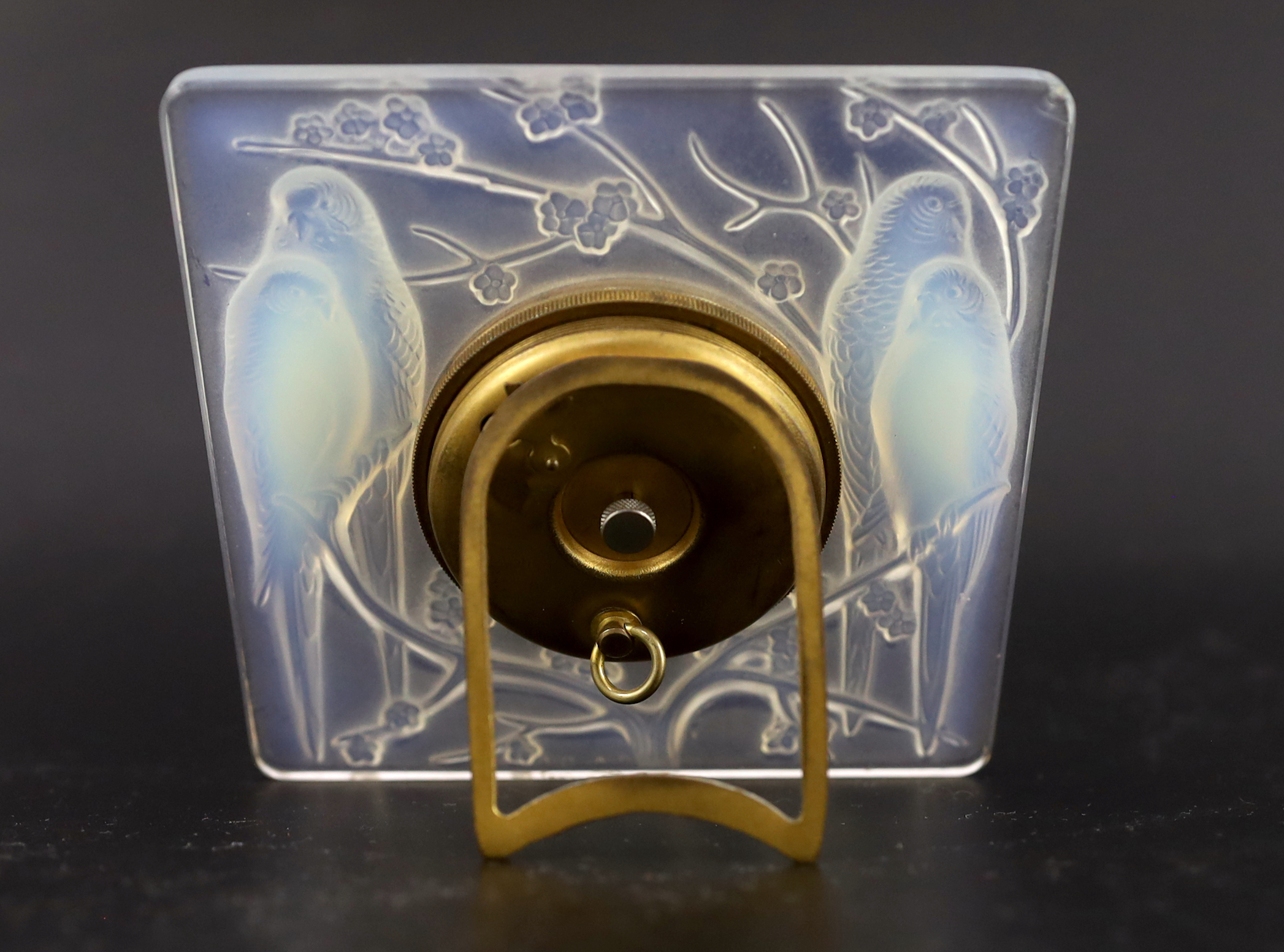 A Rene Lalique Inseparables opalescent glass desk timepiece